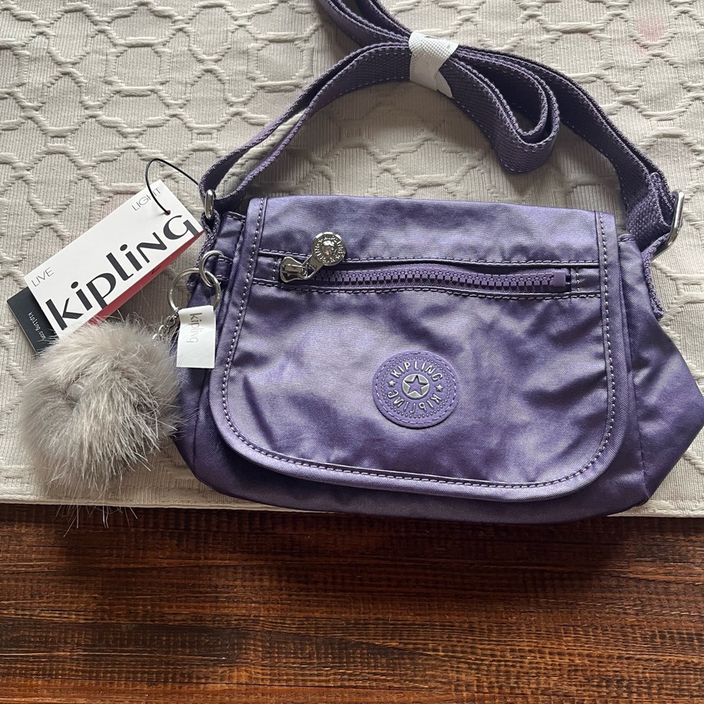 Kipling Purple Crossbody Bag with Adjustable Strap and Signature Charm